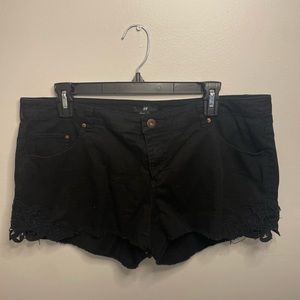 Size 12 black H&M shorts with crochet design